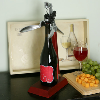 PAMPERED GRAPE™ Wizard Corkscrew with Stand - Ergonomic corkscrew with base allows you to remove corks from your wine bottles with one swift movement. Remove corkscrew from the stand when you prefer to open bottles by hand.  